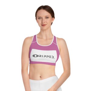 Woman in pink sports bra with RIPPED logo